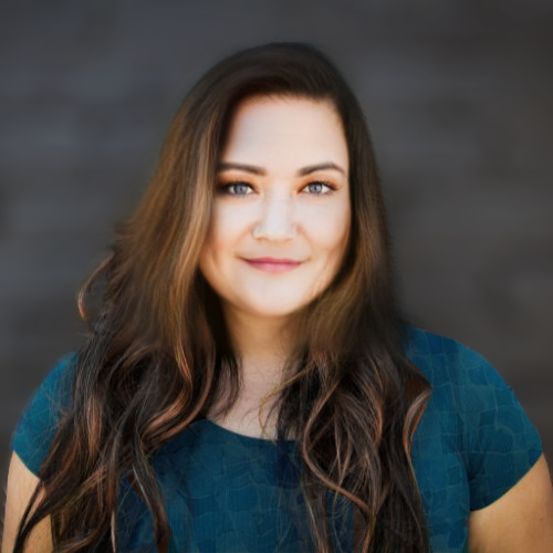 Laurel Wolfe wearing a teal patterned shirt.